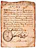 An example of the first paper money issued in the British colonies - 20 shilling note issued by Massachussetts on February 3, 1690.