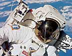 NASA Astronaut above the Earth in space suit